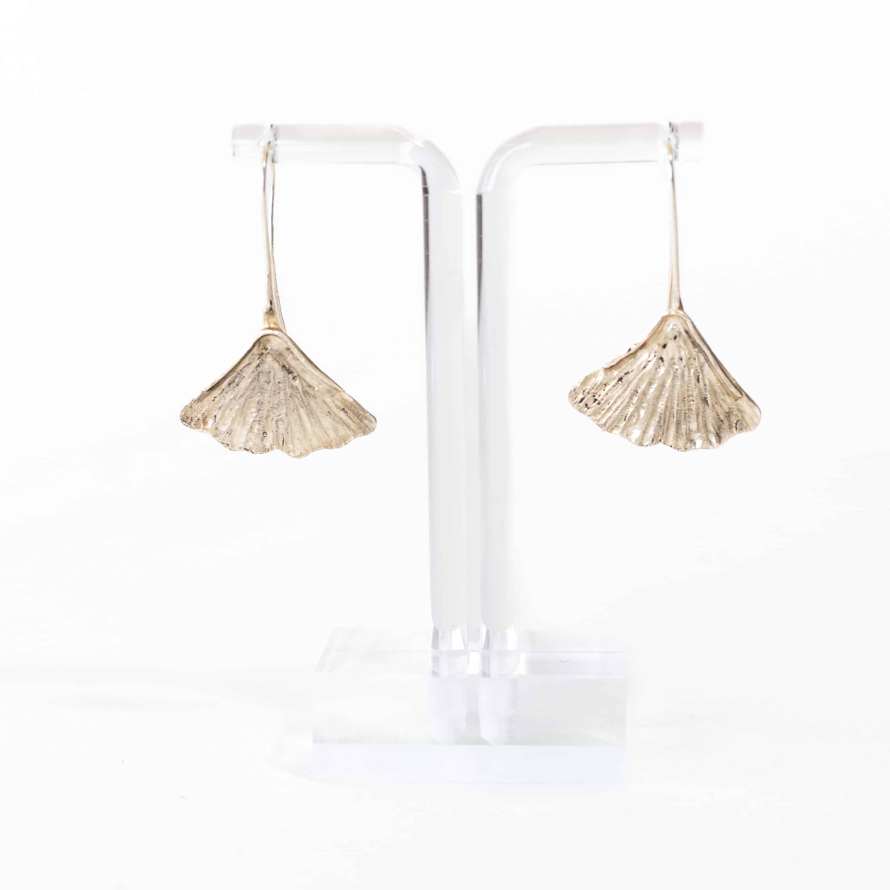 Silver ginkgo leaf earrings.