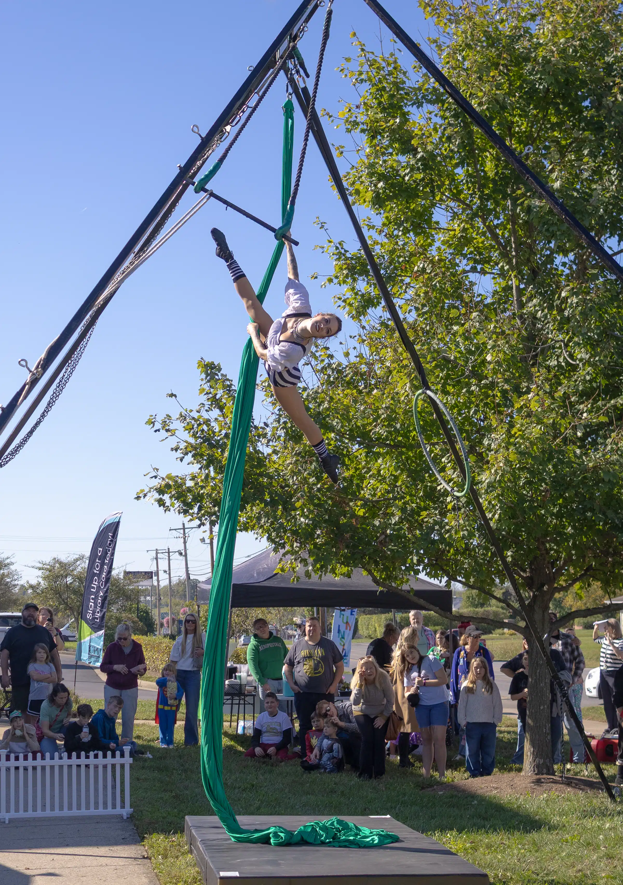 An aerialist from Queen City Circus