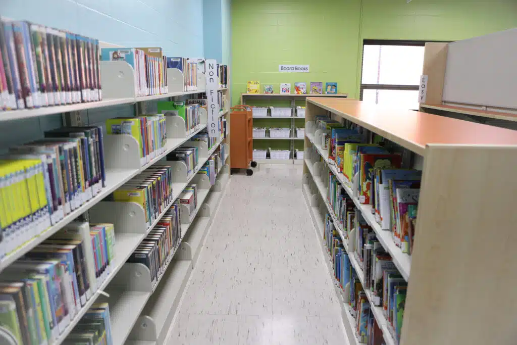 Children's book shelves in JCPL+ Wilmore.