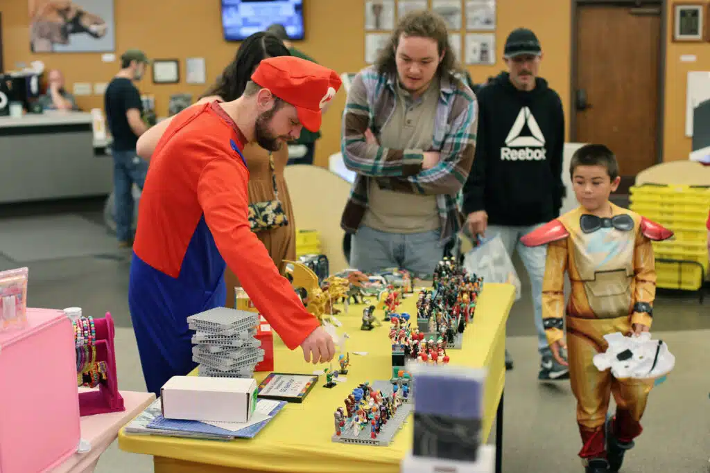 A vendor displays minifigs.